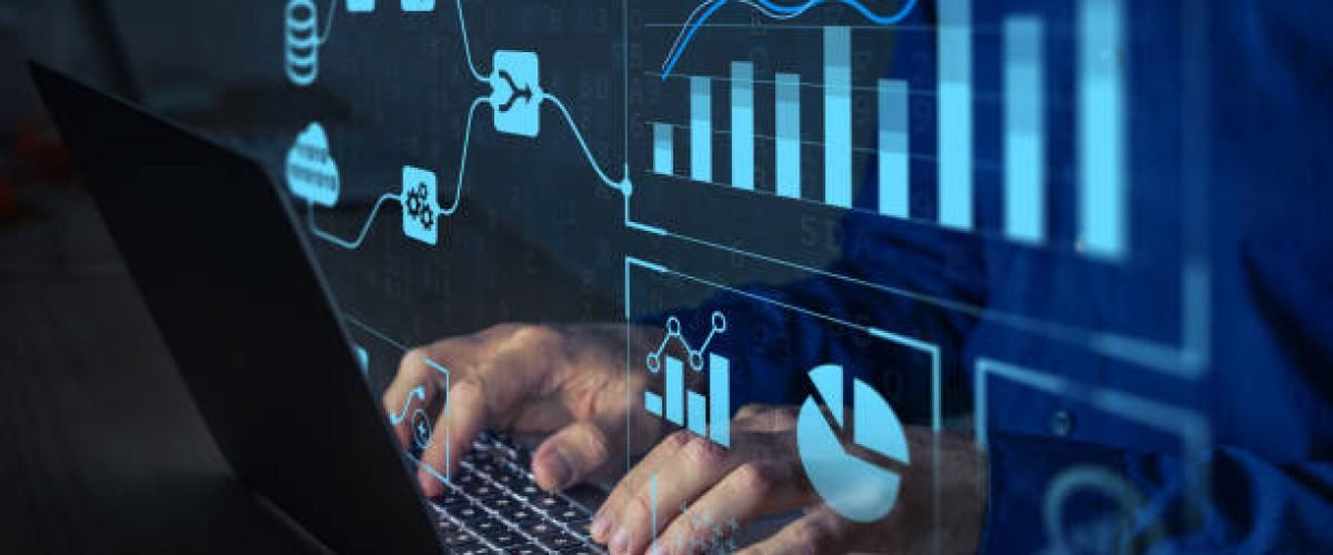 Analyst working with Business Analytics and Data Management System on computer to make report with KPI and metrics connected to database. Corporate strategy for finance, operations, sales, marketing